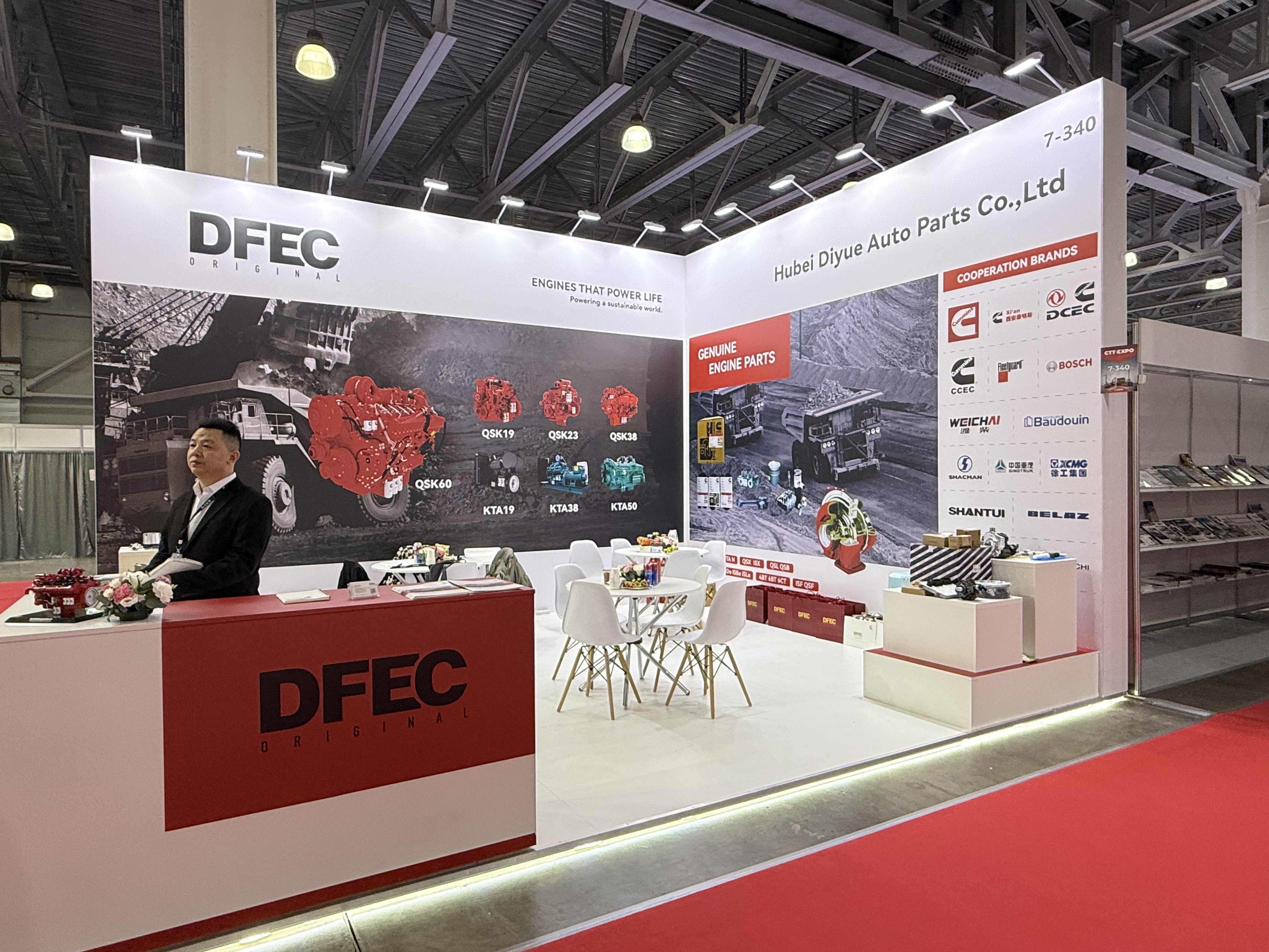 DFEC booth 7-340 at CTT Expo 2026 in Moscow, showing Cummins engines and parts